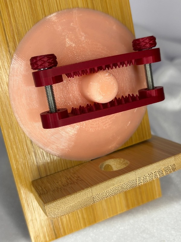 Custom Designed ruby red Nipple Bar Clamps (aggressive bite)