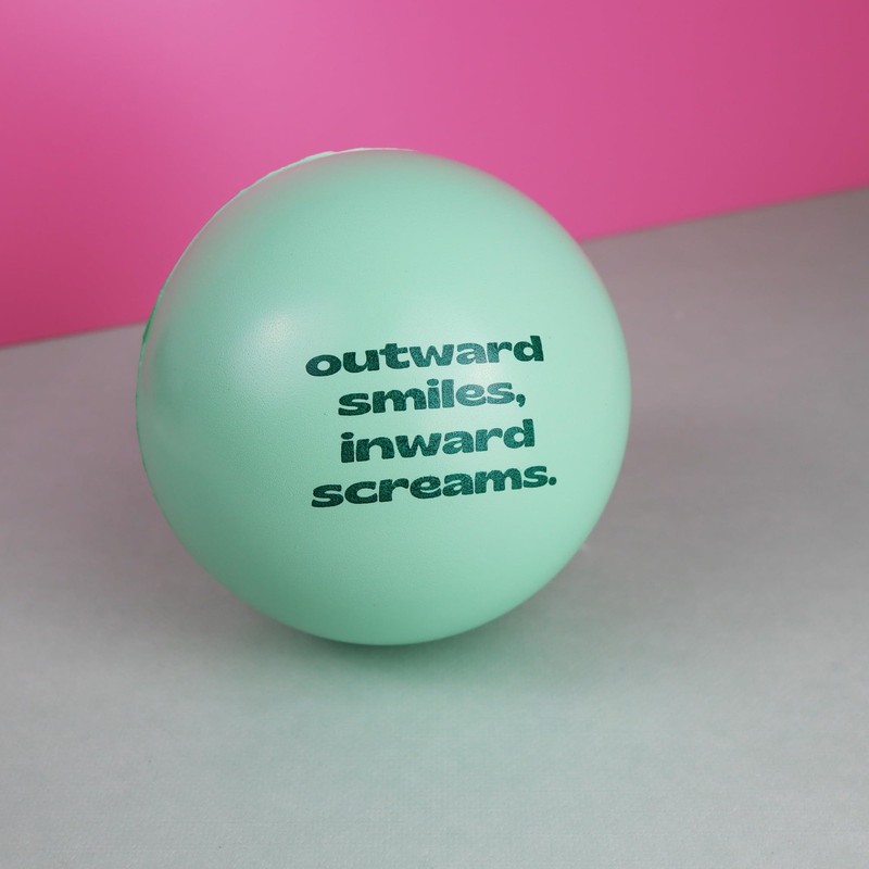 Needzo - Outward Smiles, Inward Screams Stress Ball Grip Small, Green gallery